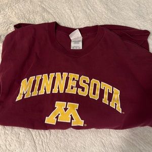 Minnesota long sleeve crew neck. The shirt is Maroon with Gold lettering.